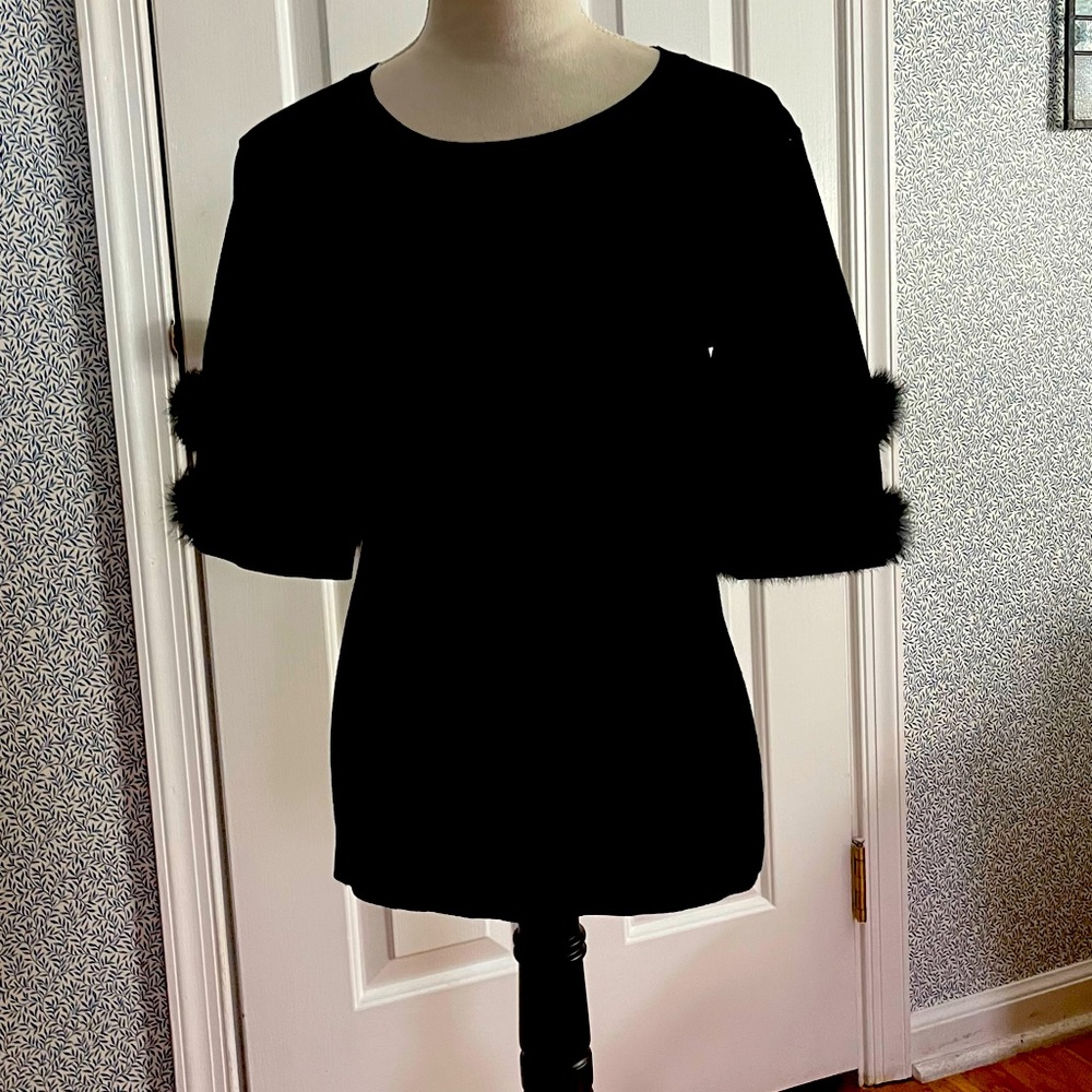 Black knit short sleeve top with faux fur cuffs